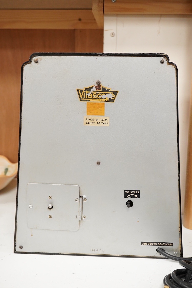 A 1930s ‘Vitascope’ black bakelite clock, 33cm high